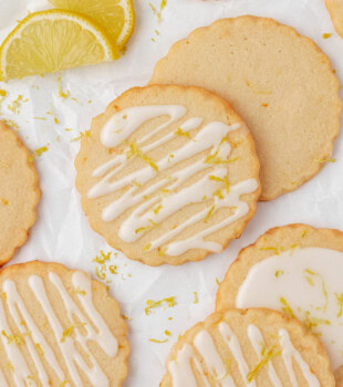 overhead view of lemon shortbread cookies drizzled with lemon glaze
