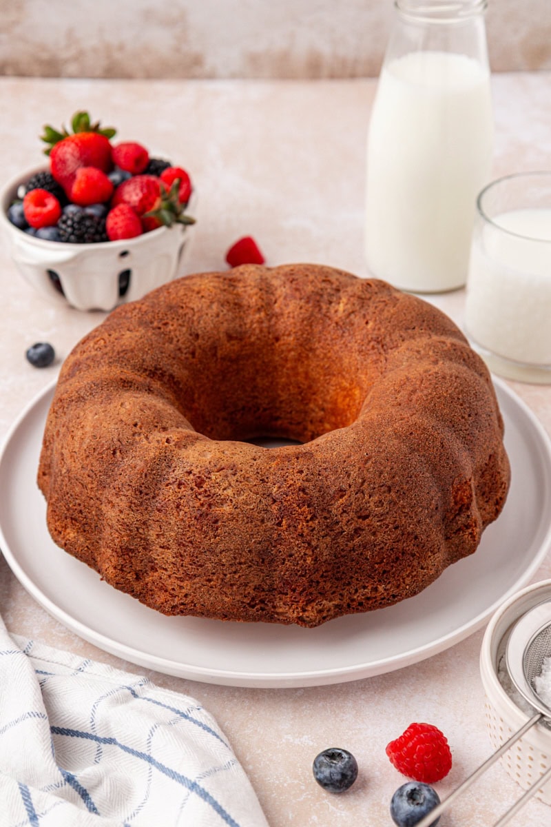 buttermilk pound cake served on a white cake plate