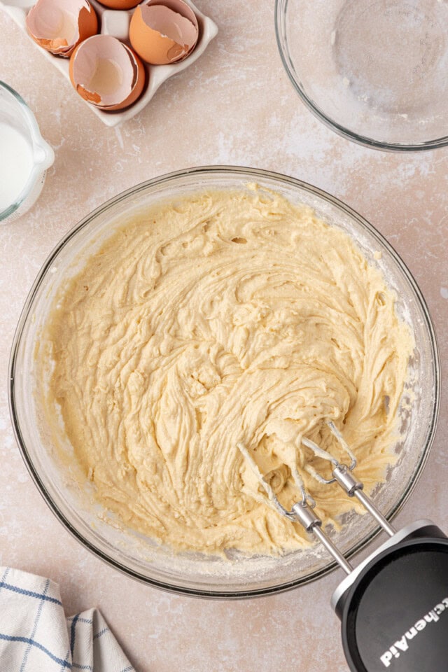 overhead view of buttermilk pound cake batter in a mixing bowl