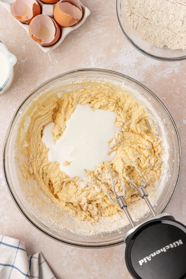 overhead view of buttermilk added to pound cake batter