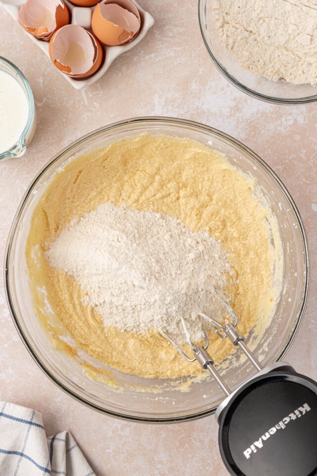 overhead view of dry ingredients added to pound cake batter
