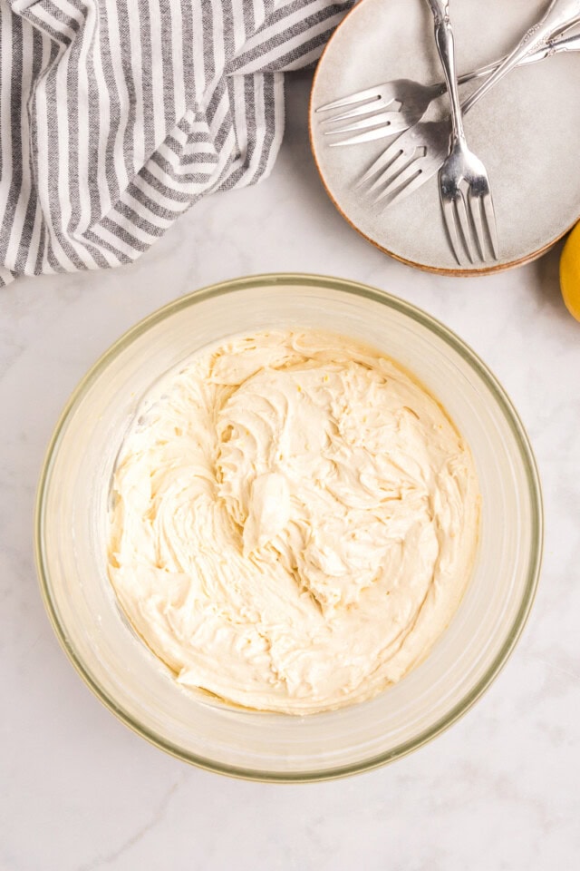 overhead view of lemon cake batter in a mixing bowl