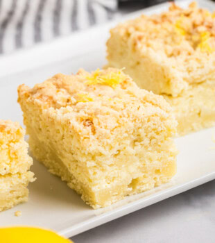 slices of lemon cream cheese coffee cake on a white plate
