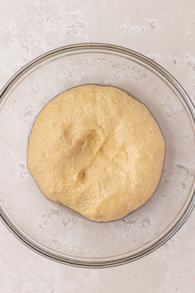 overhead view of bread dough after first rise