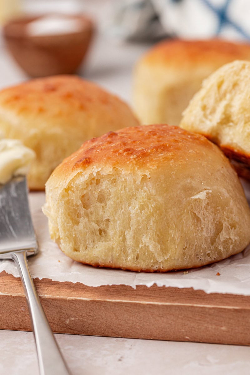 close up of a dinner roll showing the fluffy texture