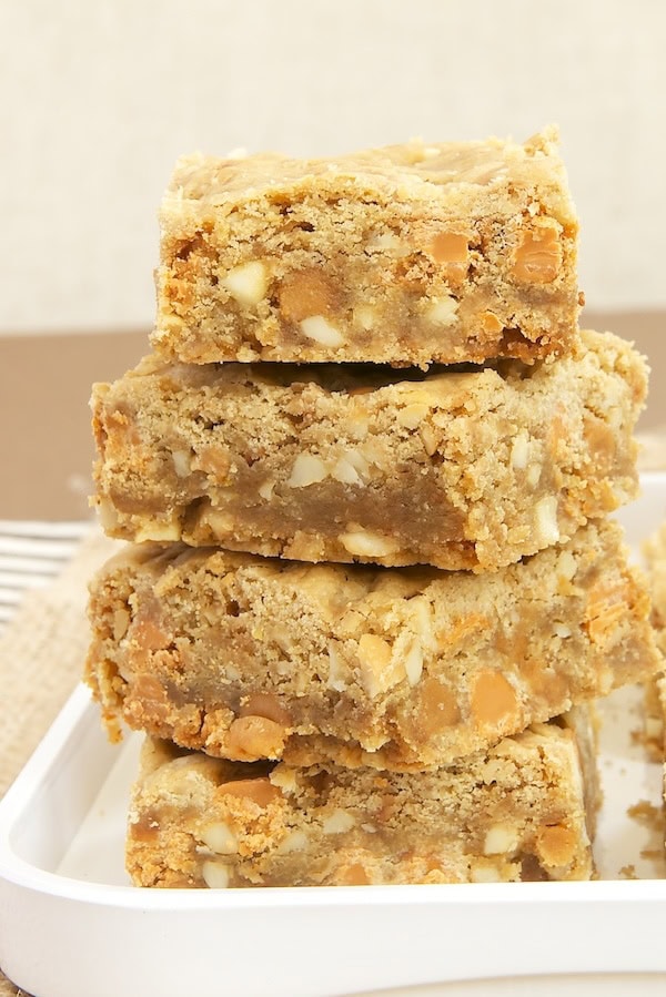 stacked Butterscotch Toffee Blondies on a white plate