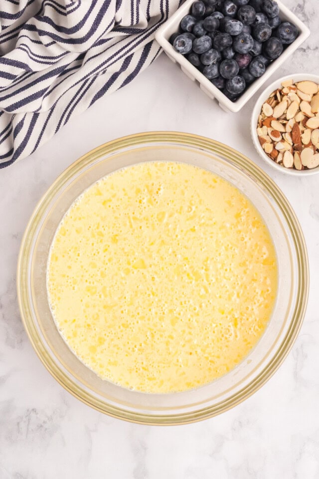 overhead view of custard mixture in a mixing bowl