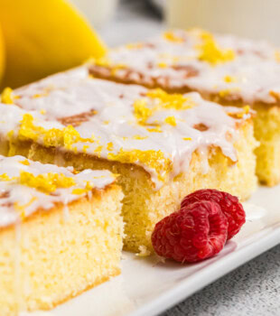 a lemon pound cake bar topped with a lemony glaze