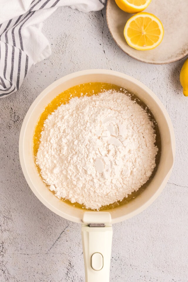 dry ingredients added to wet ingredients for lemon cake bar batter