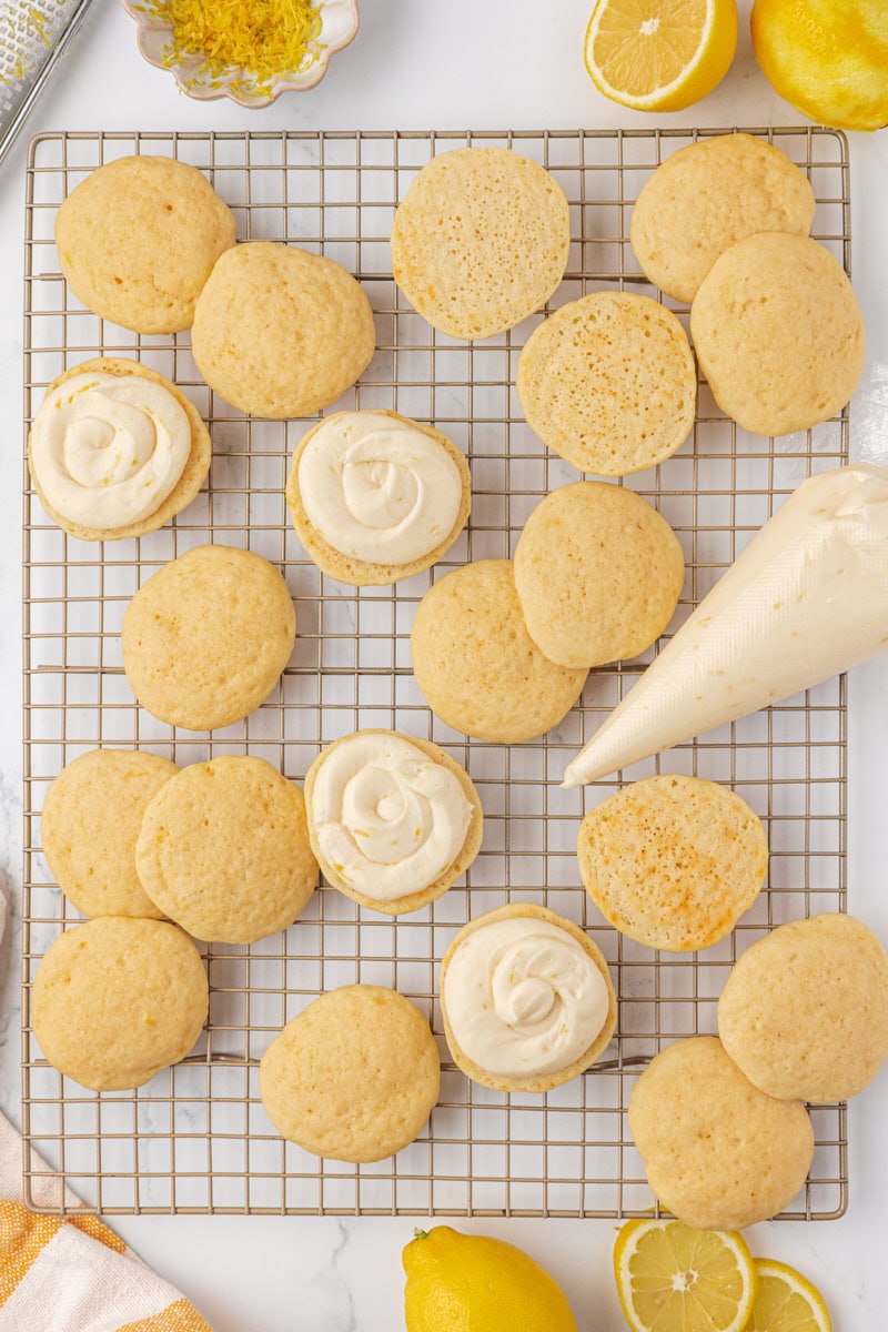 creamy lemon filling piped onto soft lemon cookies