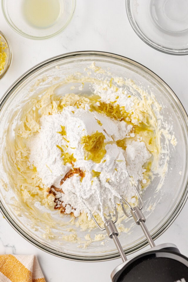 confectioners' sugar, vanilla, lemon juice, and lemon zest added to beaten cream cheese and butter
