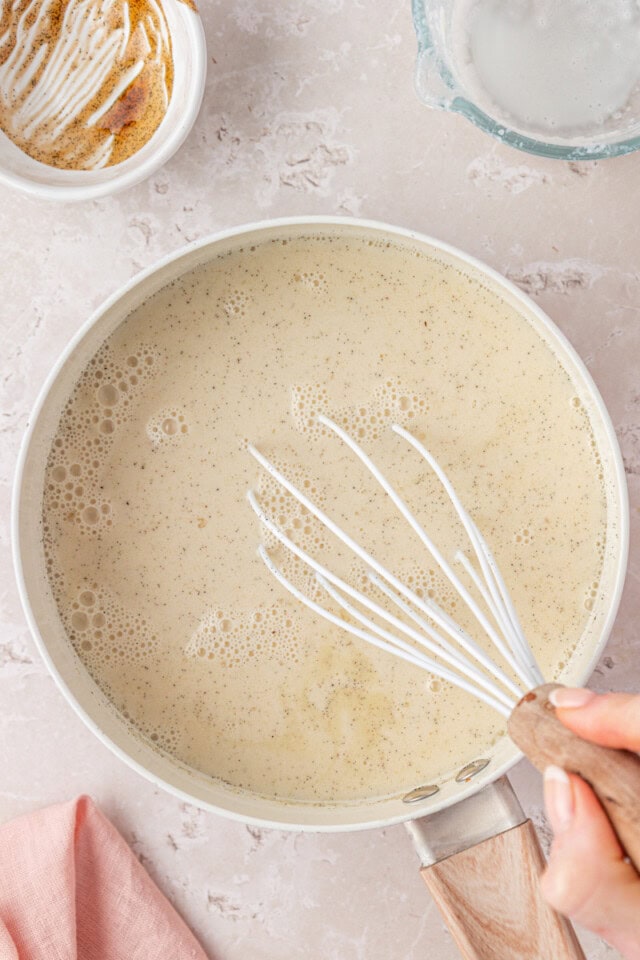 overhead view of vanilla panna cotta mixture in a saucepan