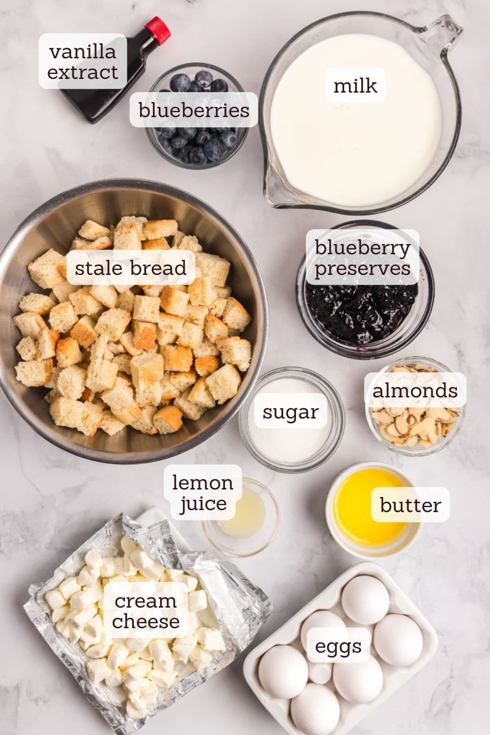 overhead view of ingredients for blueberry cream cheese bread pudding
