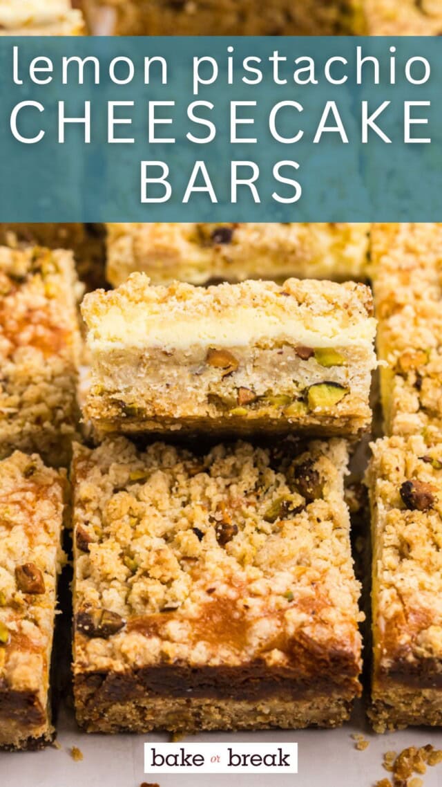close up of a lemon pistachio cheesecake bar showing the layers of crust, filling, and crumb topping; text overlay "lemon pistachio cheesecake bars - bake or break"