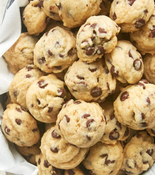 overhead view of mini chocolate chips in a towel-lined metal basket