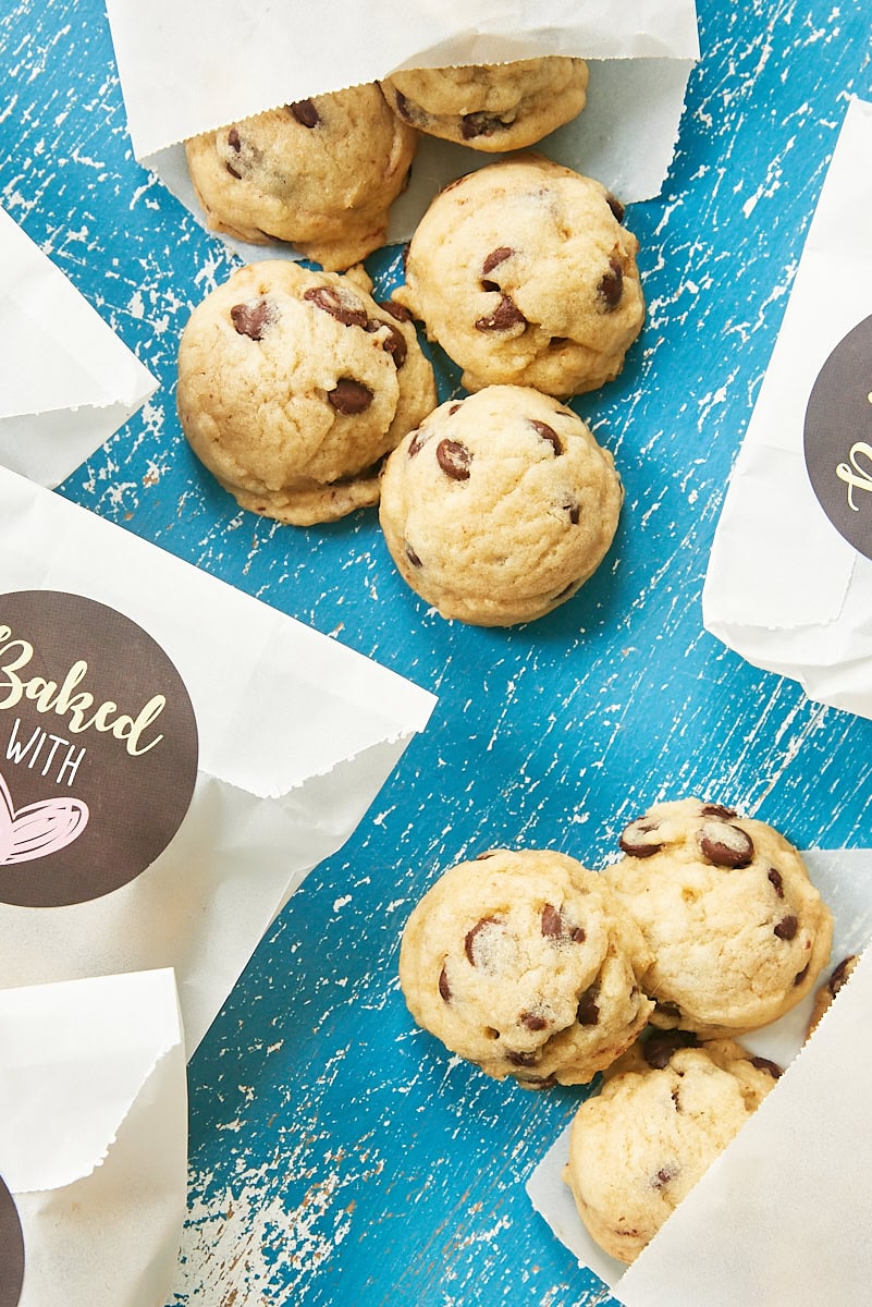 Mini Chocolate Chip Cookies are a fun, bite-size twist on classic chocolate chip cookies. Great for parties, showers, gifts, and more! Mini Chocolate Chip Cookies packaged in small favor bags