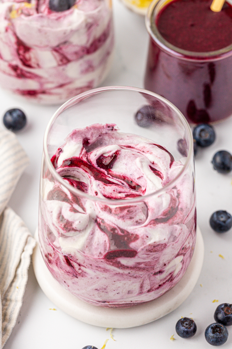 swirled blueberry fool served in a glass