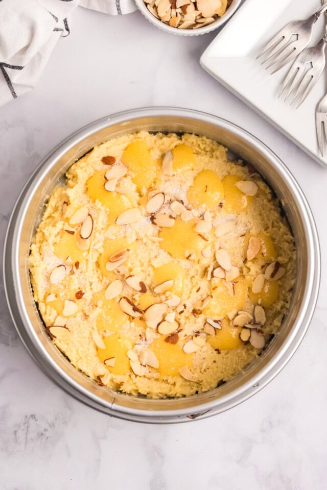 lemon almond butter cake in a cake pan before going into the oven