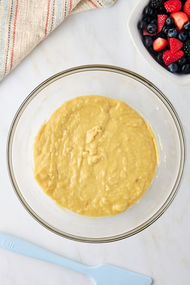 overhead view of muffin cake batter mixed in a bowl