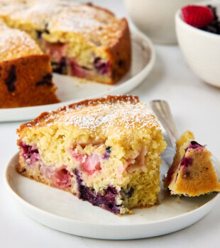slice of berry muffin cake filled with fresh berries