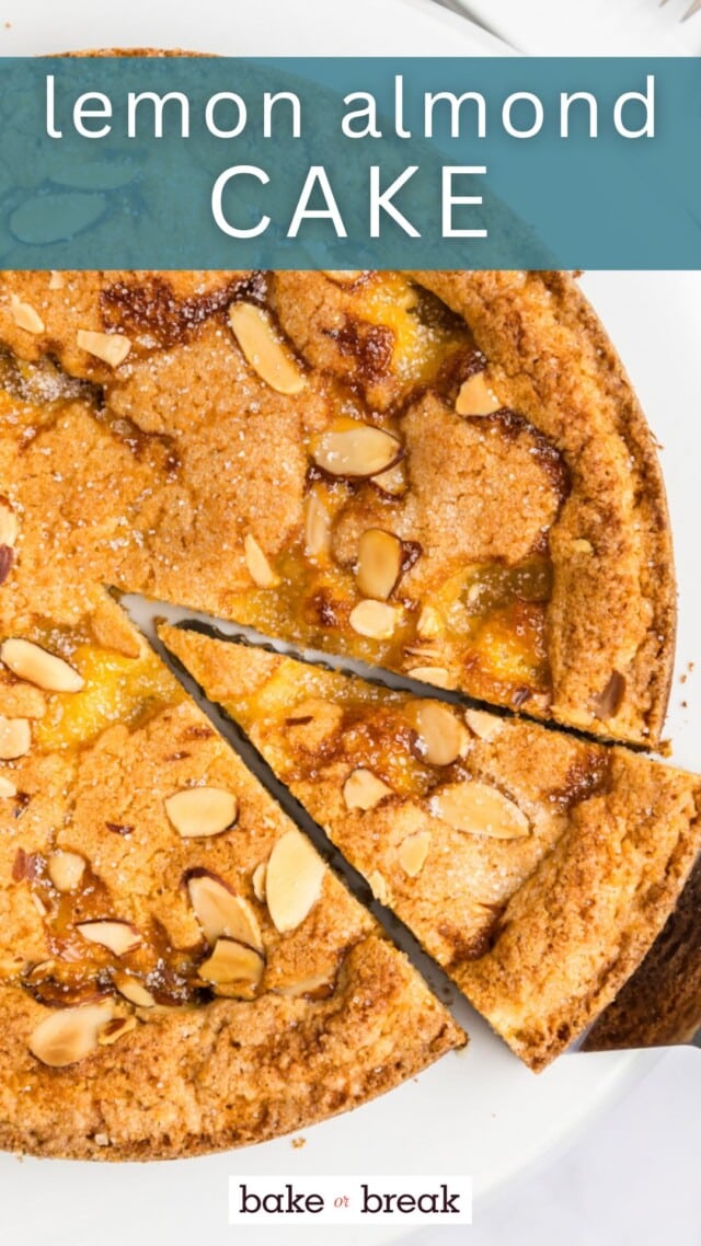 a slice of lemon almond butter cake on a cake server lifting away from the remaining cake; text overlay "lemon almond cake - bake or break"