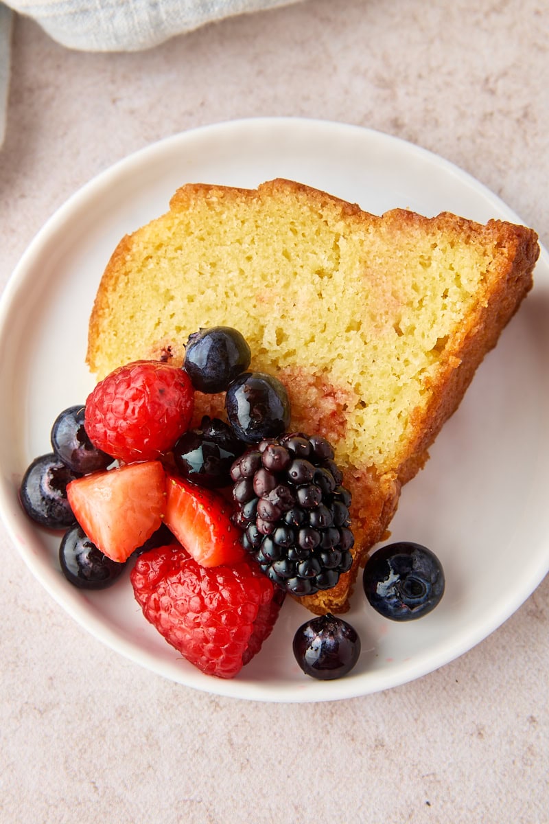 macerated berries served over a slice of pound cake