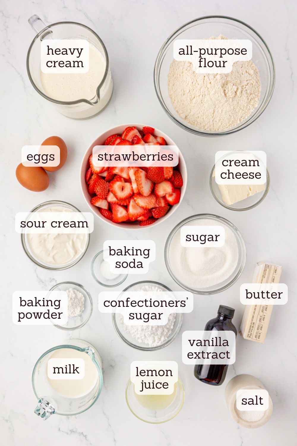 overhead view of ingredients for strawberry shortcake jars