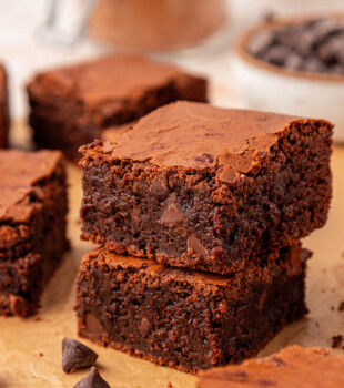 close up of two stacked brown butter brownies