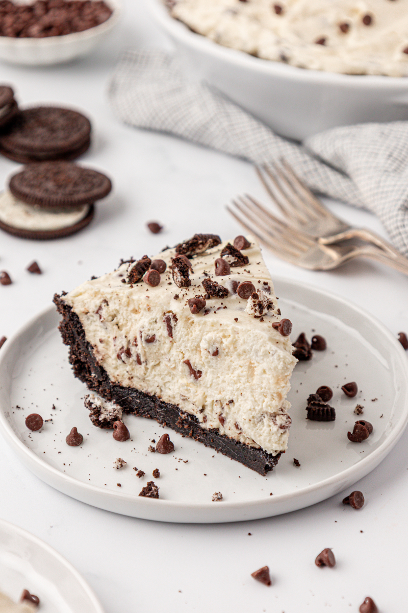 a slice of chocolate chip icebox pie with Oreo crust