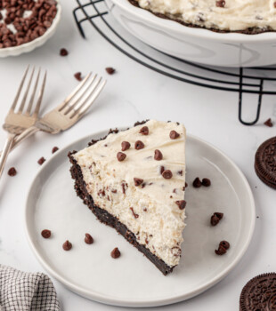 a slice of chocolate chip icebox pie with Oreo crust
