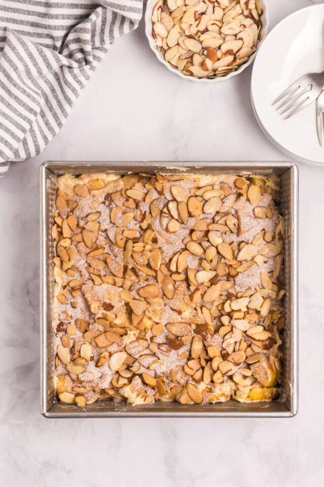 peach buckle topped with cinnamon-almond mixture before baking