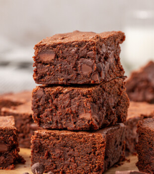 stack of three rich, moist sour cream brownies with a texture somewhere between cakey and fudgy