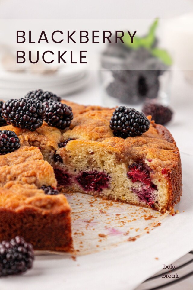 partially sliced blackberry buckle filled with fresh berries; text overlay "blackberry buckle"