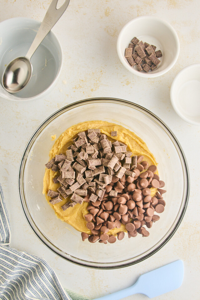 chocolate chunks and chocolate chips added to blondie batter