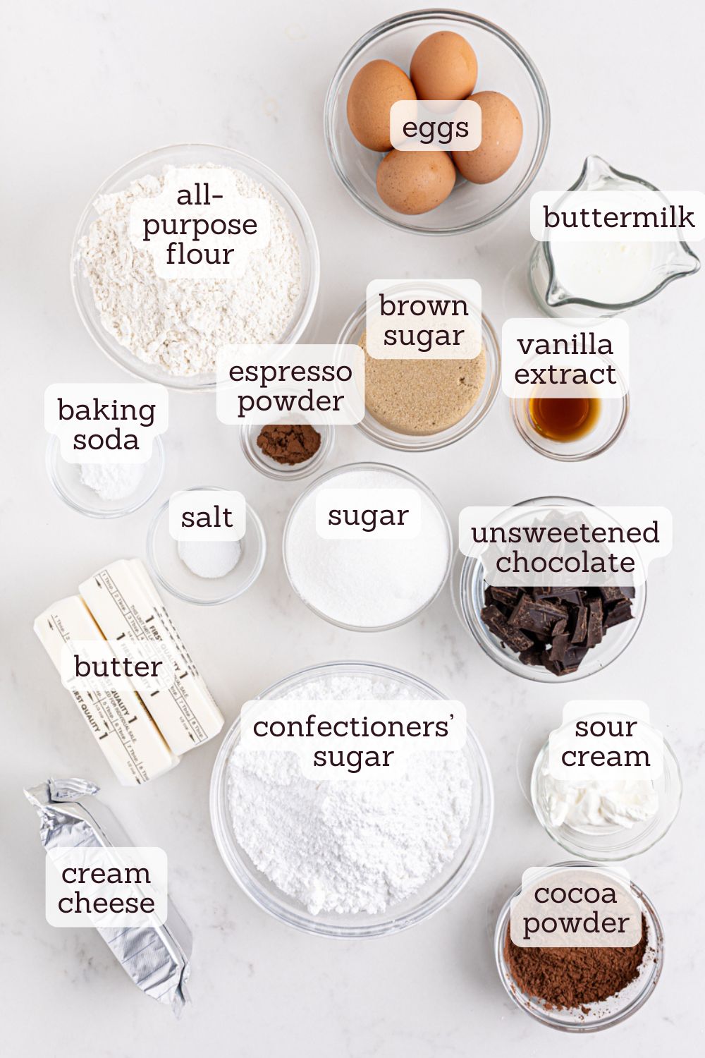 overhead view of ingredients for chocolate layer cake with cream cheese filling