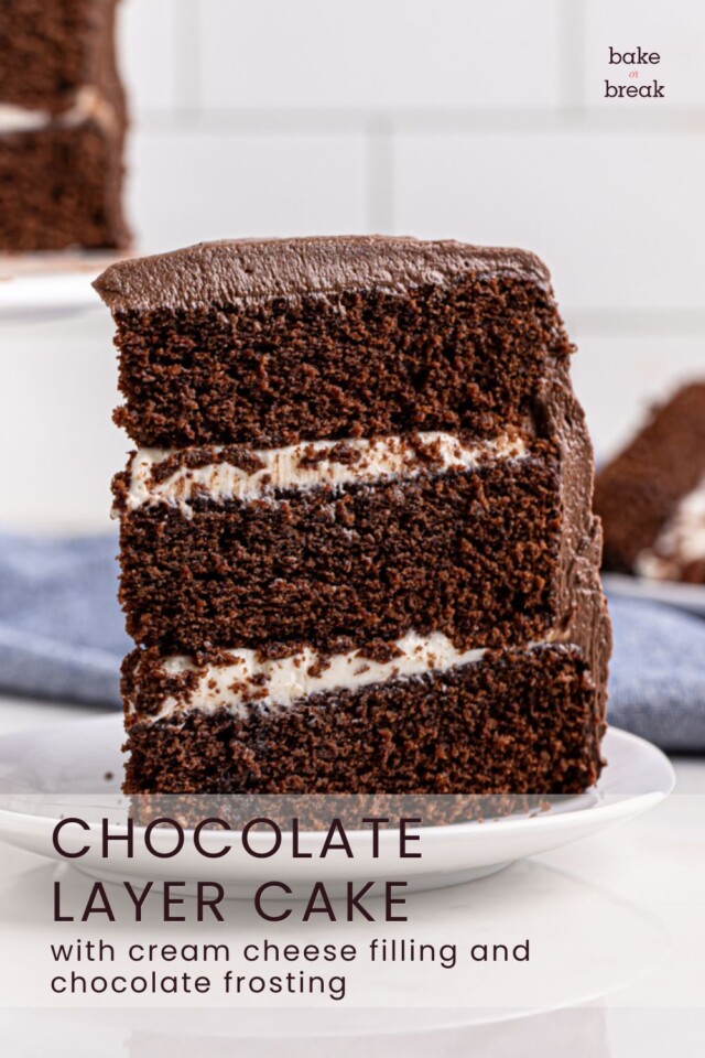 slice of chocolate layer cake with cream cheese filling and chocolate sour cream frosting; text overlay "chocolate layer cake with cream cheese filling and chocolate frosting"