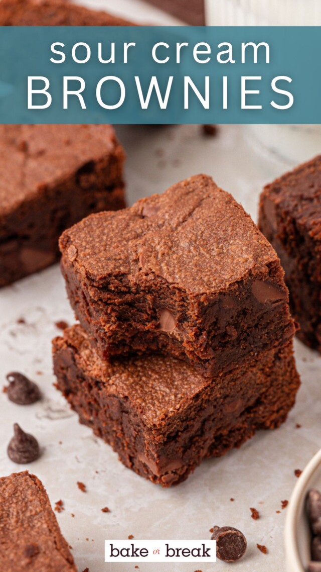stack of two brownies filled with chocolate chips; text overlay "sour cream brownies - bake or break"
