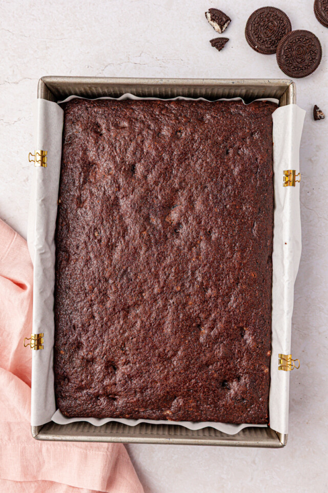 freshly baked chocolate Oreo cake in a 9x13 baking pan