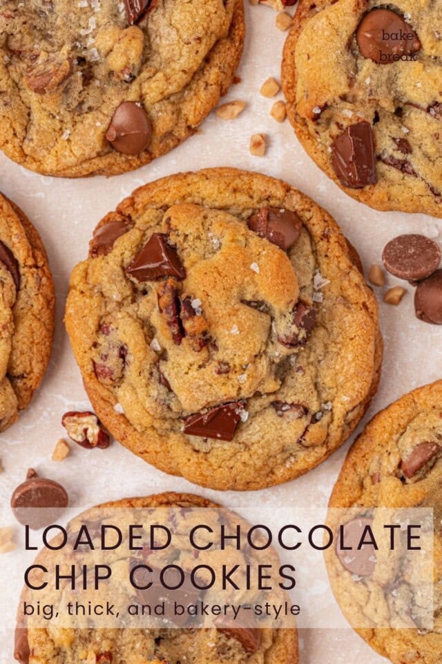 overhead view of big, bakery-style chocolate chip cookies; text overlay "loaded chocolate chip cookies - big, thick, and bakery-style"