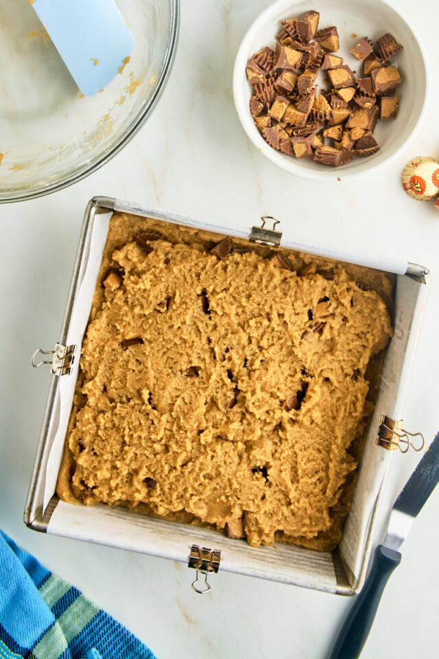 a second layer of peanut butter blondie batter added to peanut butter cup blondies