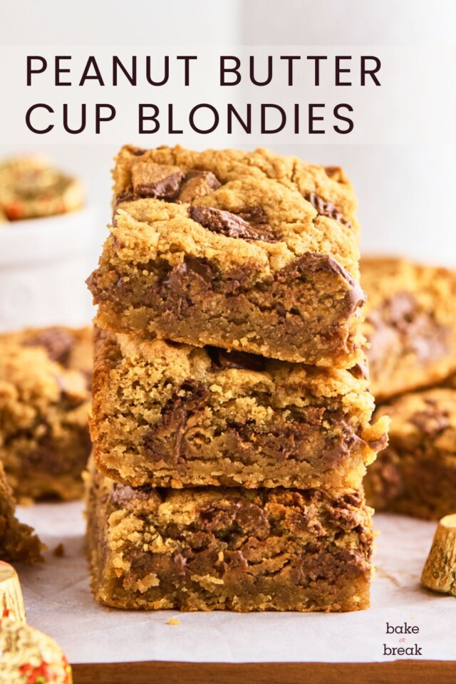 stack of three thick, chewy peanut butter blondies filled with peanut butter cups; text overlay "peanut butter cup blondies"