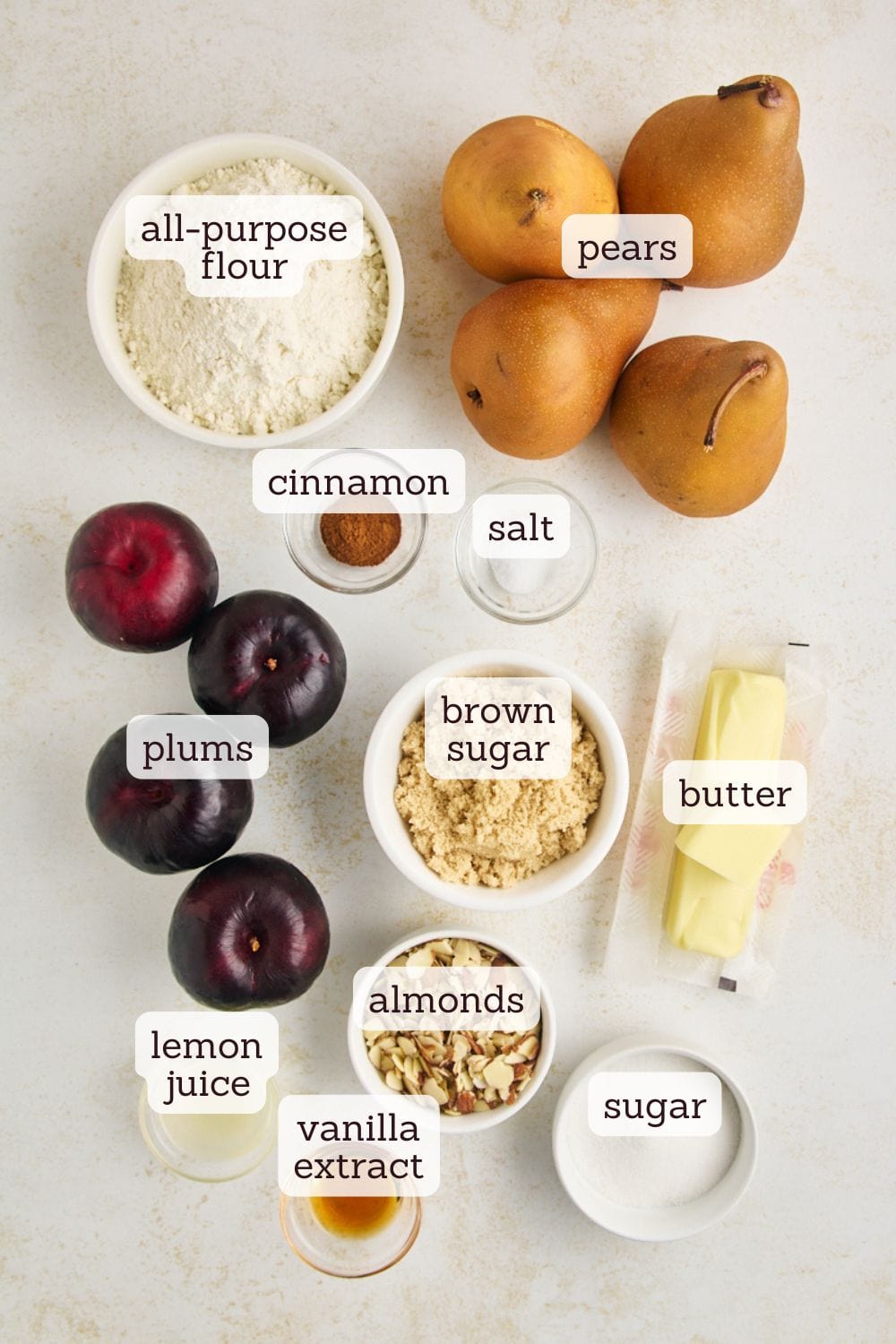 overhead view of ingredients for pear and plum crumble