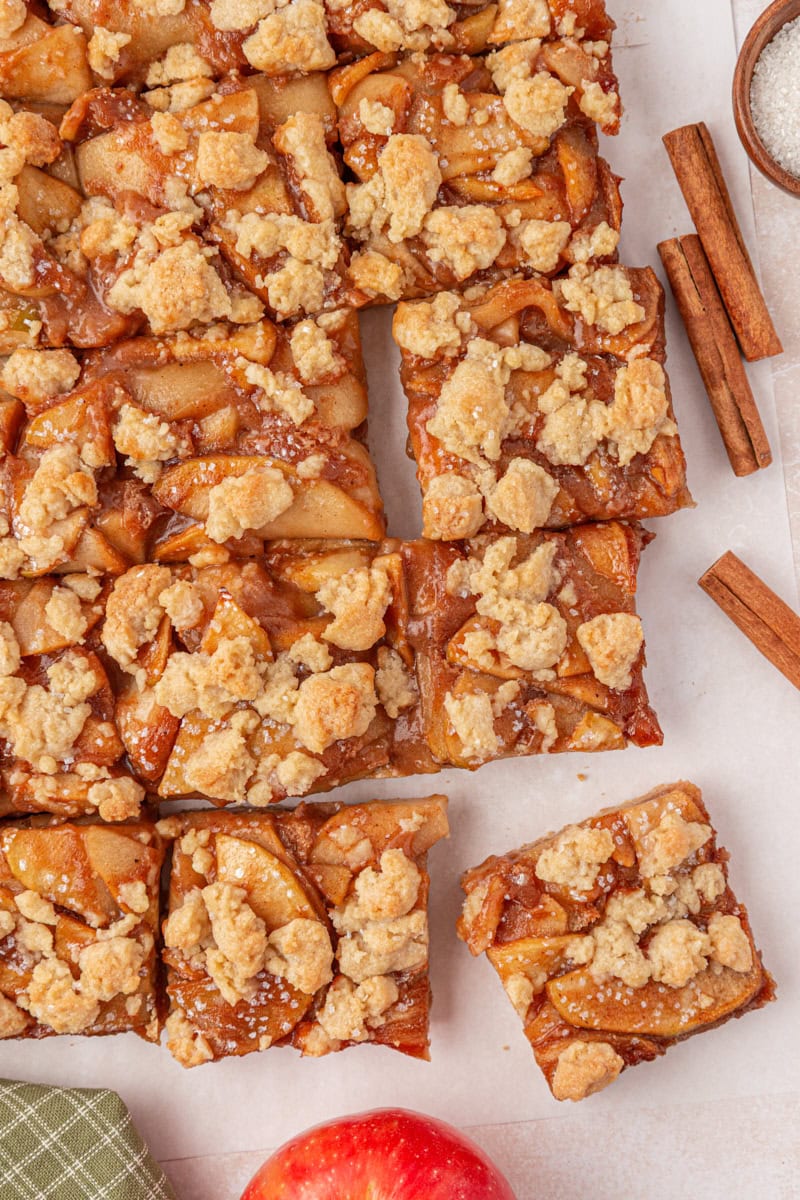 overhead view of sliced apple pie bars with buttery crumb topping