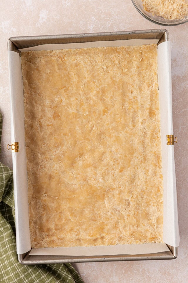 overhead view of crust pressed into the bottom of a 9x13 pan