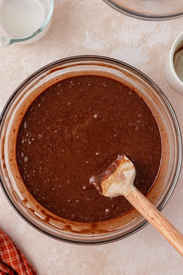 chocolate cupcake batter in a glass mixing bowl