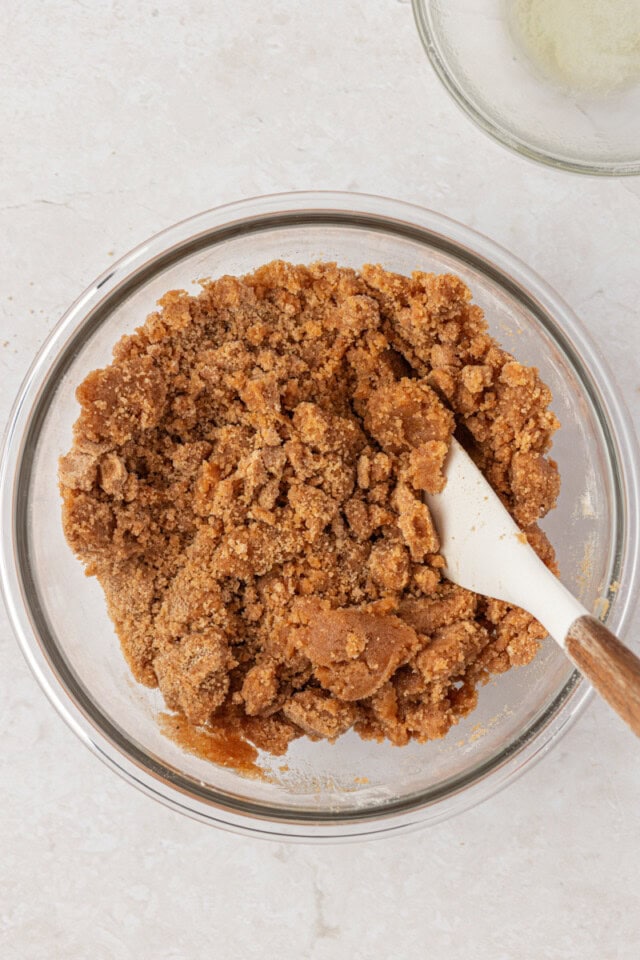 cinnamon streusel mixture in a glass mixing bowl