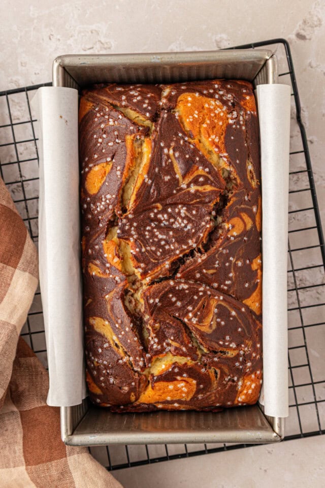 freshly baked marble loaf cake in a loaf pan
