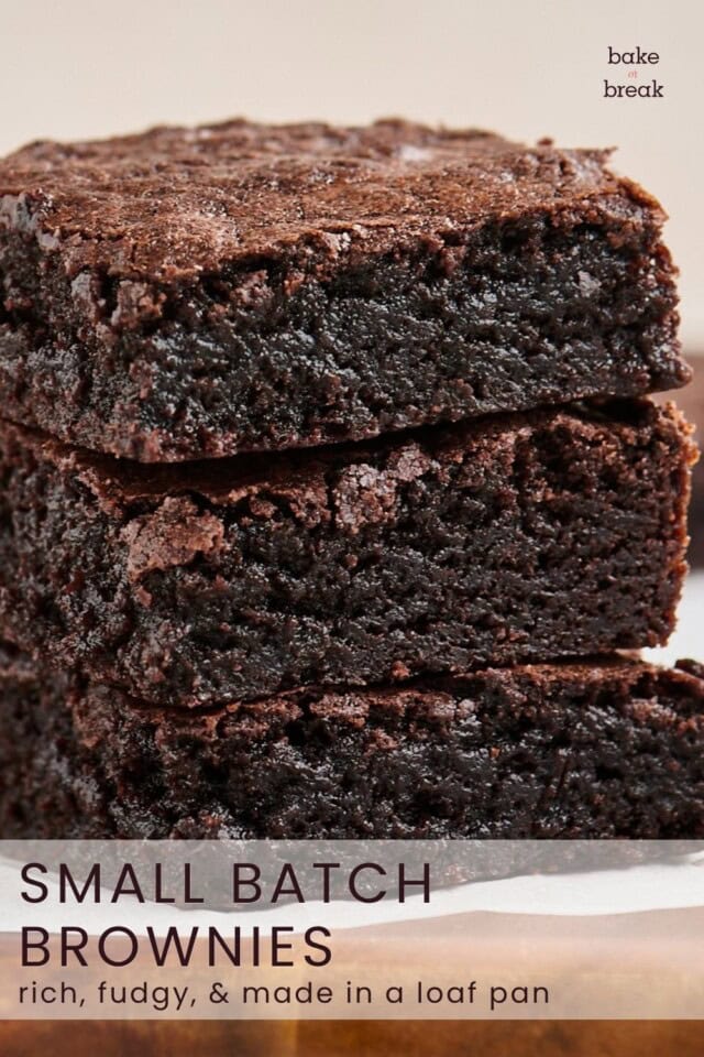 close up stack of three fudgy brownies; text overlay "small batch brownies - rich, fudgy, & made in a loaf pan"