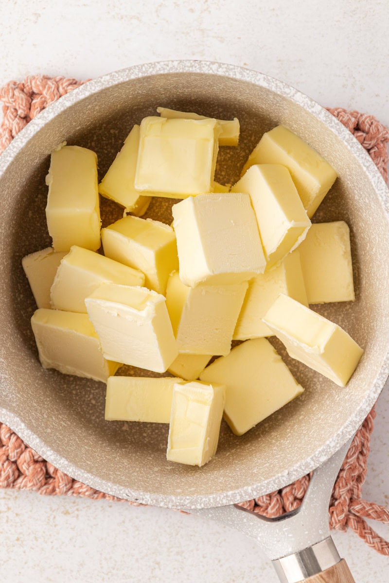 slices of butter in a saucepan