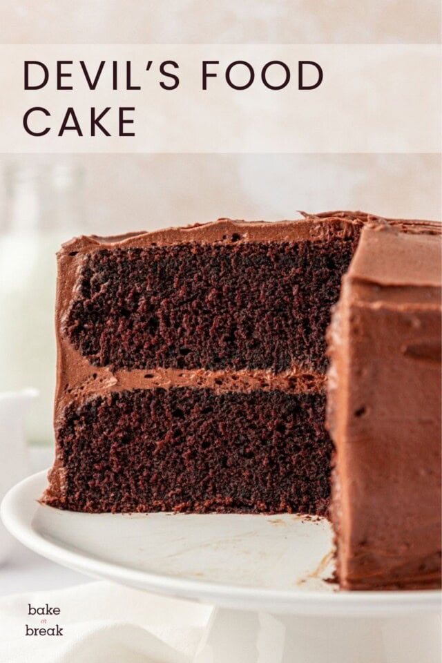 close up of partially sliced chocolate cake with chocolate frosting; text overlay "devil's food cake"